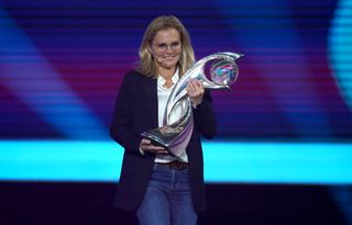 England head coach Sarina Wiegman with the trophy during the UEFA Women's Euro 2022 draw