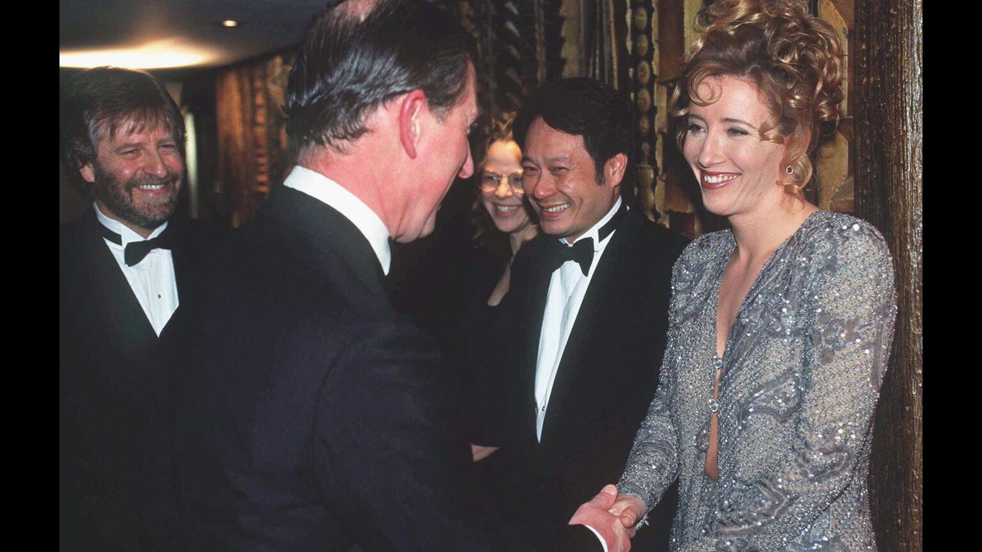 King Charles and Emma Thompson shaking hands
