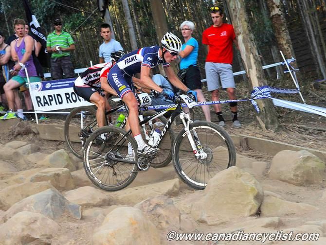 France and Austria battle on the second lap