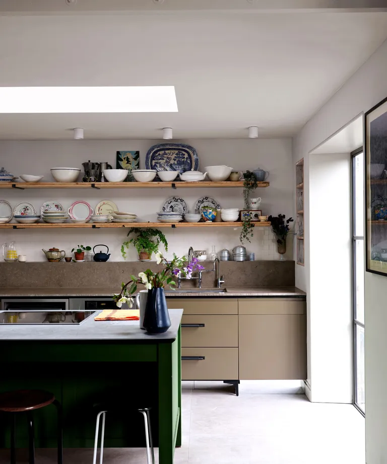 A kitchen painted in F&B Stirabout No.300 and Beverly No.310