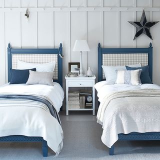 bedroom with white wall and blue blakeney