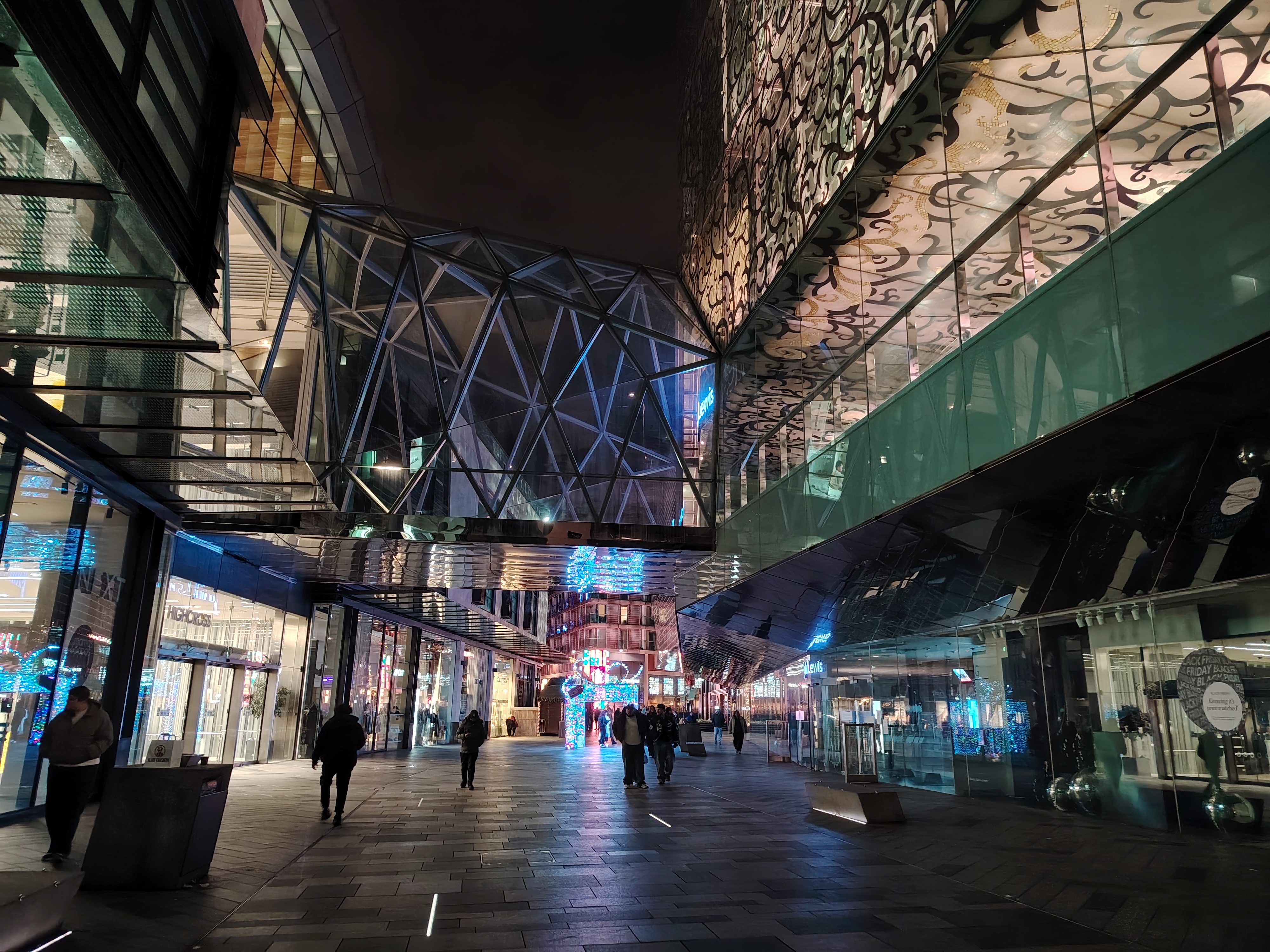 Exterior of a large shopping centre at night