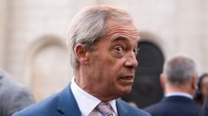 Nigel Farage, Reform UK leader, grimacing