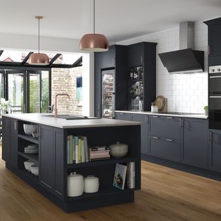 kitchen area with grey cabinets and wooden floor