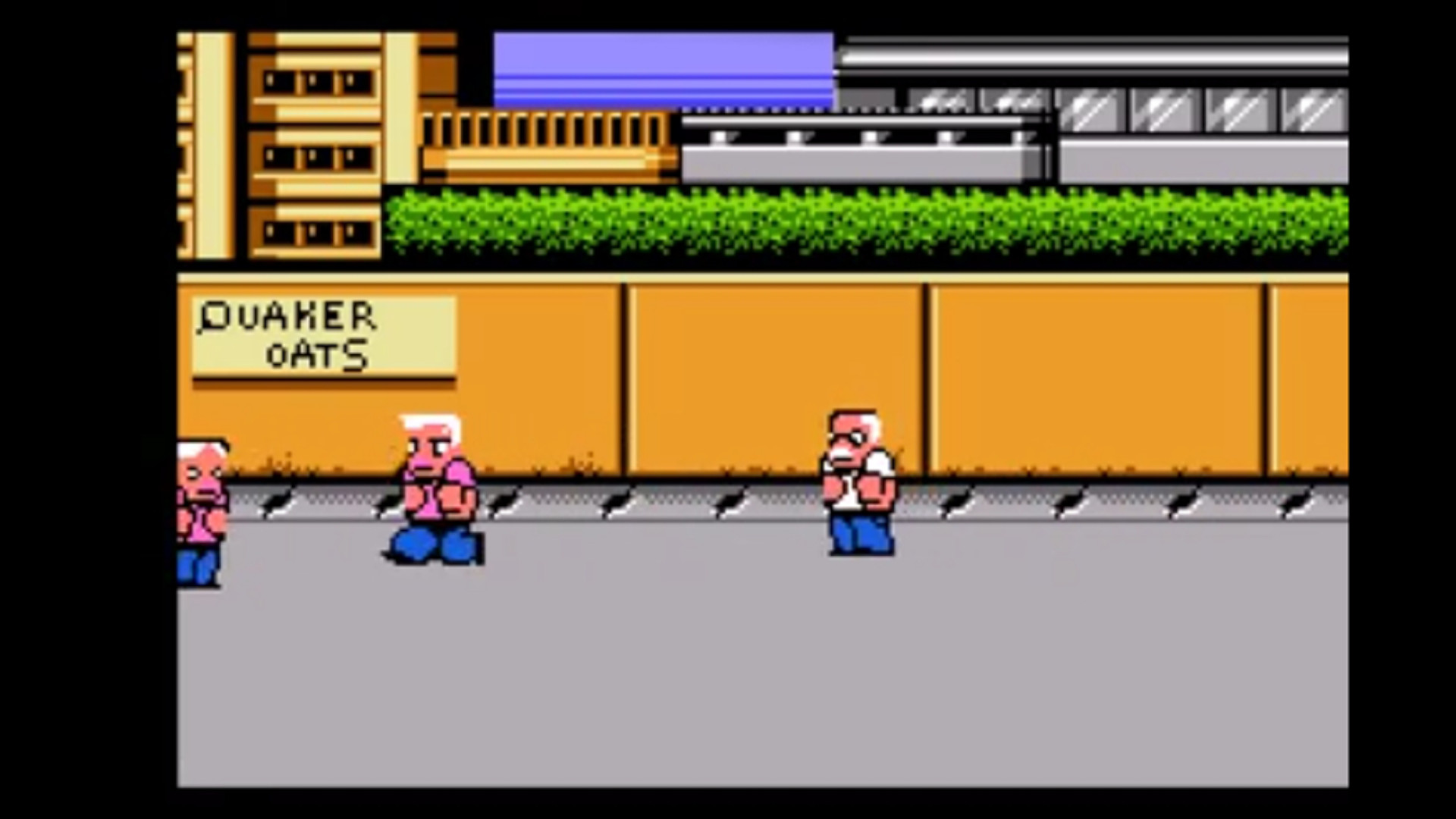 Best NES games: a group of old thugs walking the street during River City Ransom