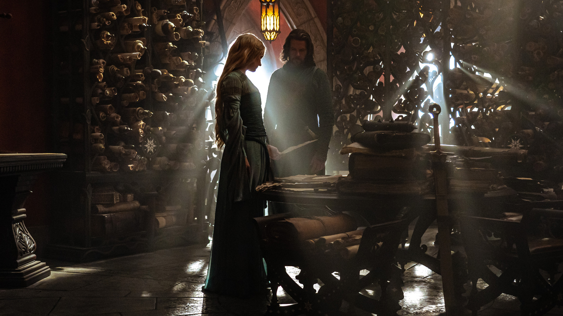 Galadriel and Elendil look at documents in Númenor's Hall of Law in The Rings of Power episode 3