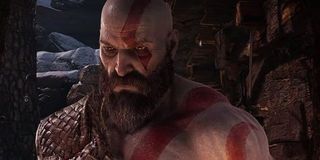 Kratos brooding in God of War.