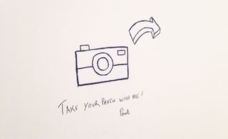 A drawing of a camera with the words "Take your photo with me Paul" below it