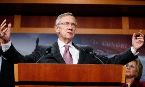 A senior adviser to Harry Reid invested in a renewable-energy firm that benefited from legislation the senator passed.