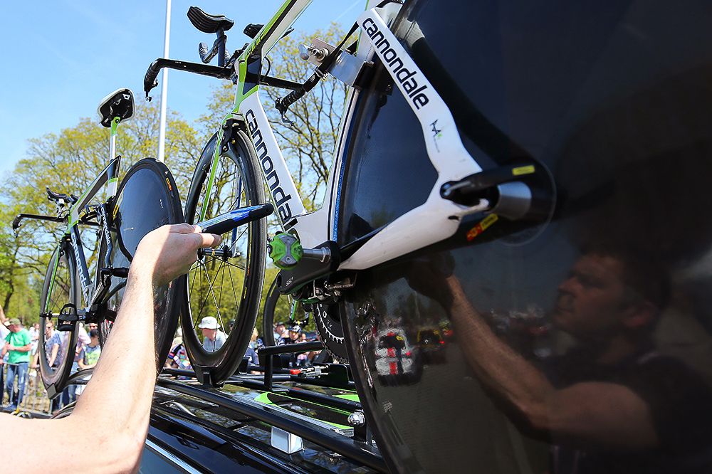 The UCI uses its special tablet to check bikes for mechanical doping during the Giro's opening stage.