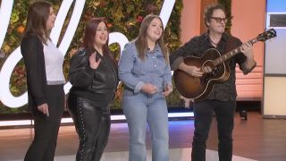 Wendy Wilson, Carnie Wilson, Lola Bonfiglio singing "One More Day" with Rob Bonfiglio playing the guitar.