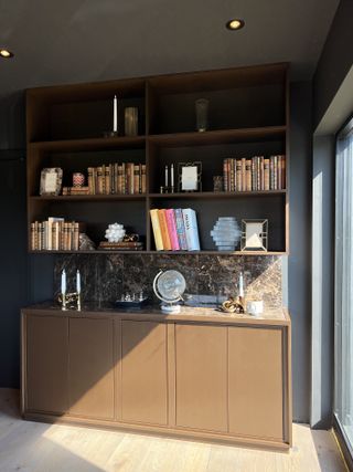 An IKEA Eket cabinet refurbished with marble shelving