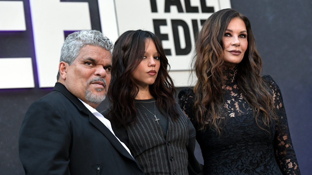 HOLLYWOOD, CALIFORNIA - NOVEMBER 09: (L-R) Luis Guzmán, Jenna Ortega and Catherine Zeta-Jones attend Netflix's Fall Edit "Wednesday" at TUDUM Theater on November 09, 2025 in Hollywood, California.