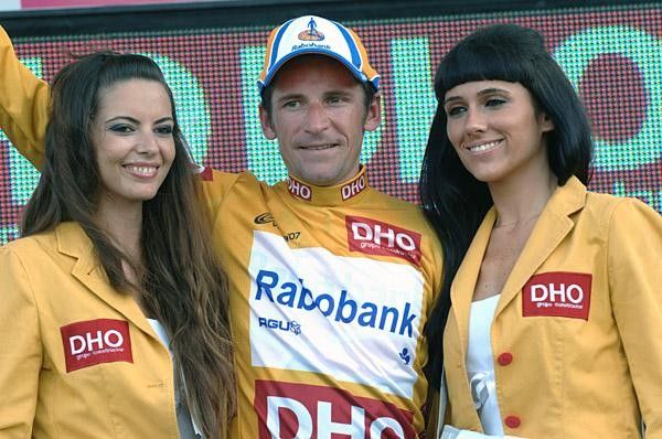 Menchov gets more podium time after holding his lead through stage 11