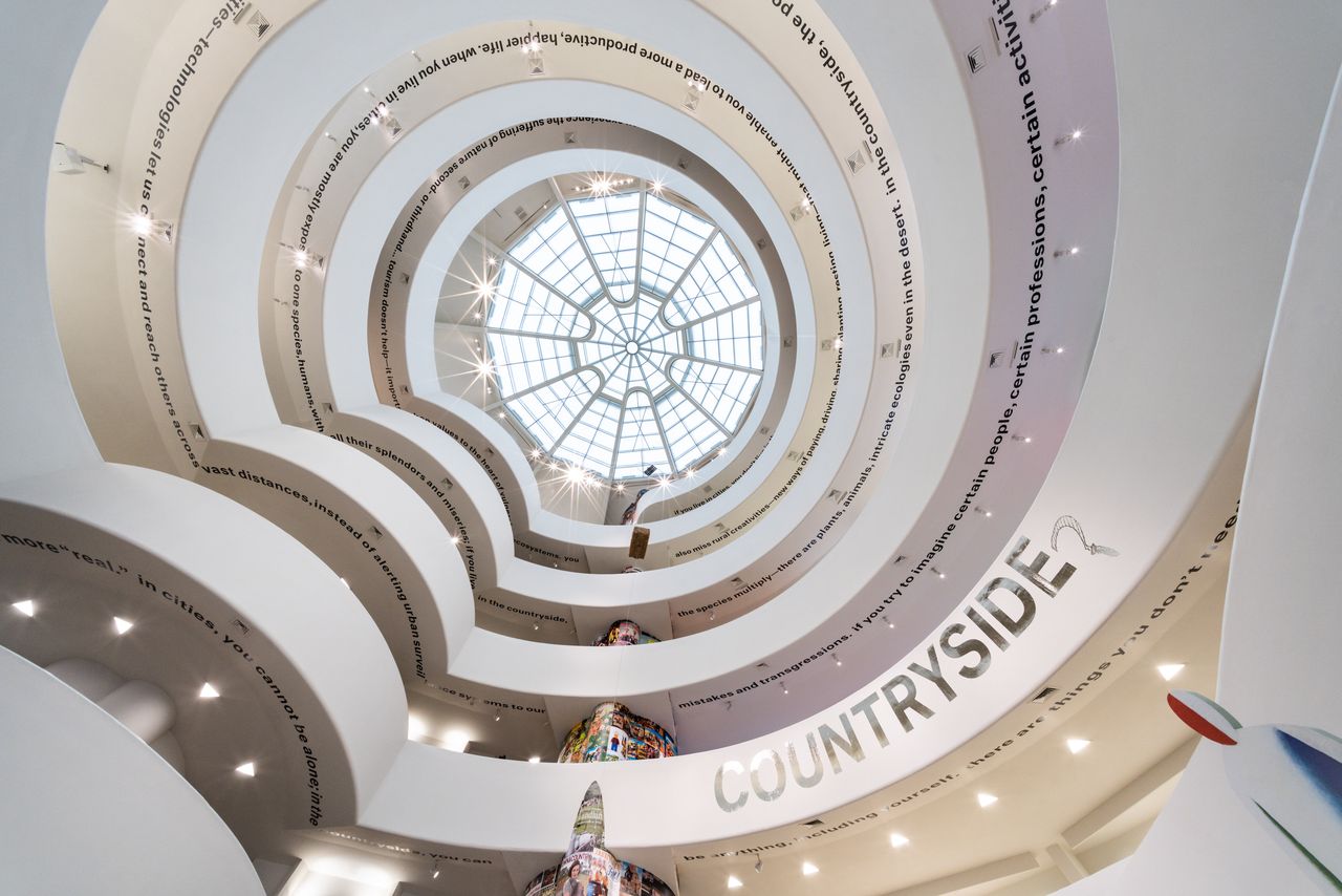 View looking up from the bottom of a spiral staircase