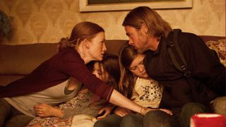 Mireille Enos and Brad Pitt in "World War Z" (2013)