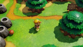 A screenshot from legend of zelda link's awakening, showing Link carrying an apple core