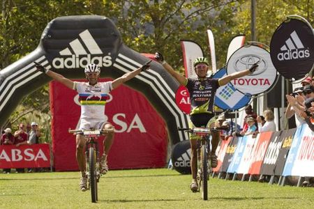 Jose Hermida and Ralph Naef of team Multivan Merida Biking 3 celebrate the win during stage 6