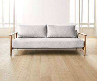 Una Gray Fabric Sleeper Sofa in a living room.