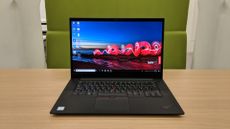 Lenovo ThinkPad X1 Extreme open on a table