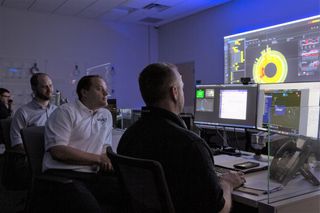 Signet network engineers remotely monitor a client’s security system at the Remote Smart network operations center.