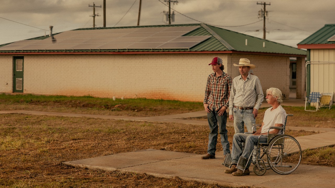 Jacob Lofland as Cooper and Billy Bob Thornton as Tommy are standing next to Sam Elliott as T.L., he&#039;s in a wheelchair.