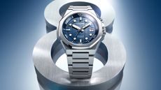 The Citizen Series 8 890 in steel and blue on a blue background