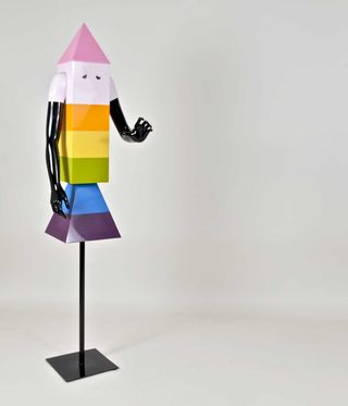 Rainbow rocket sculpture with arms