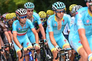 Vincenzo Nibali surrounded by teammates during stage 20.
