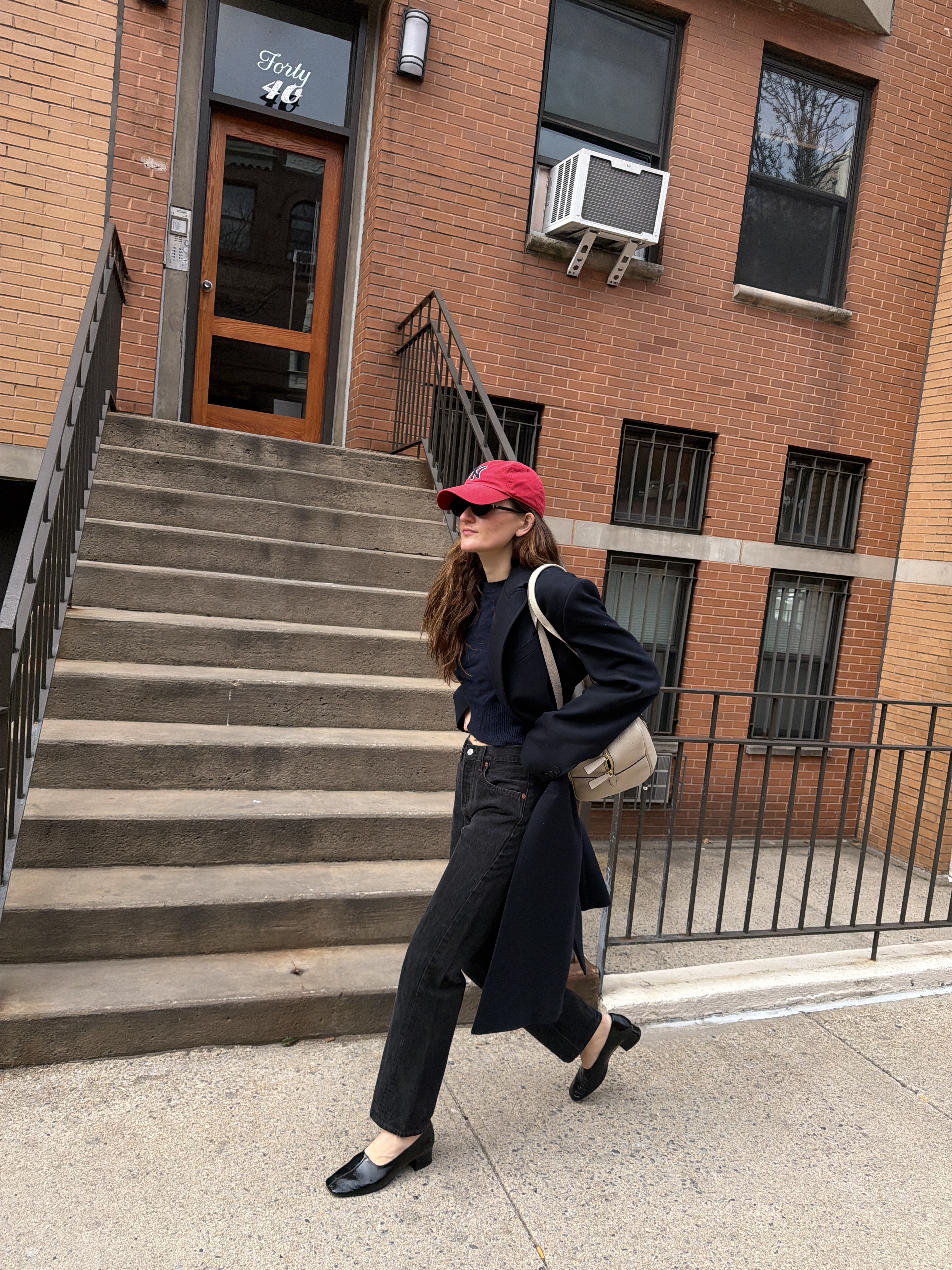 Eliza Huber wearing the Reformation Inez Pumps.