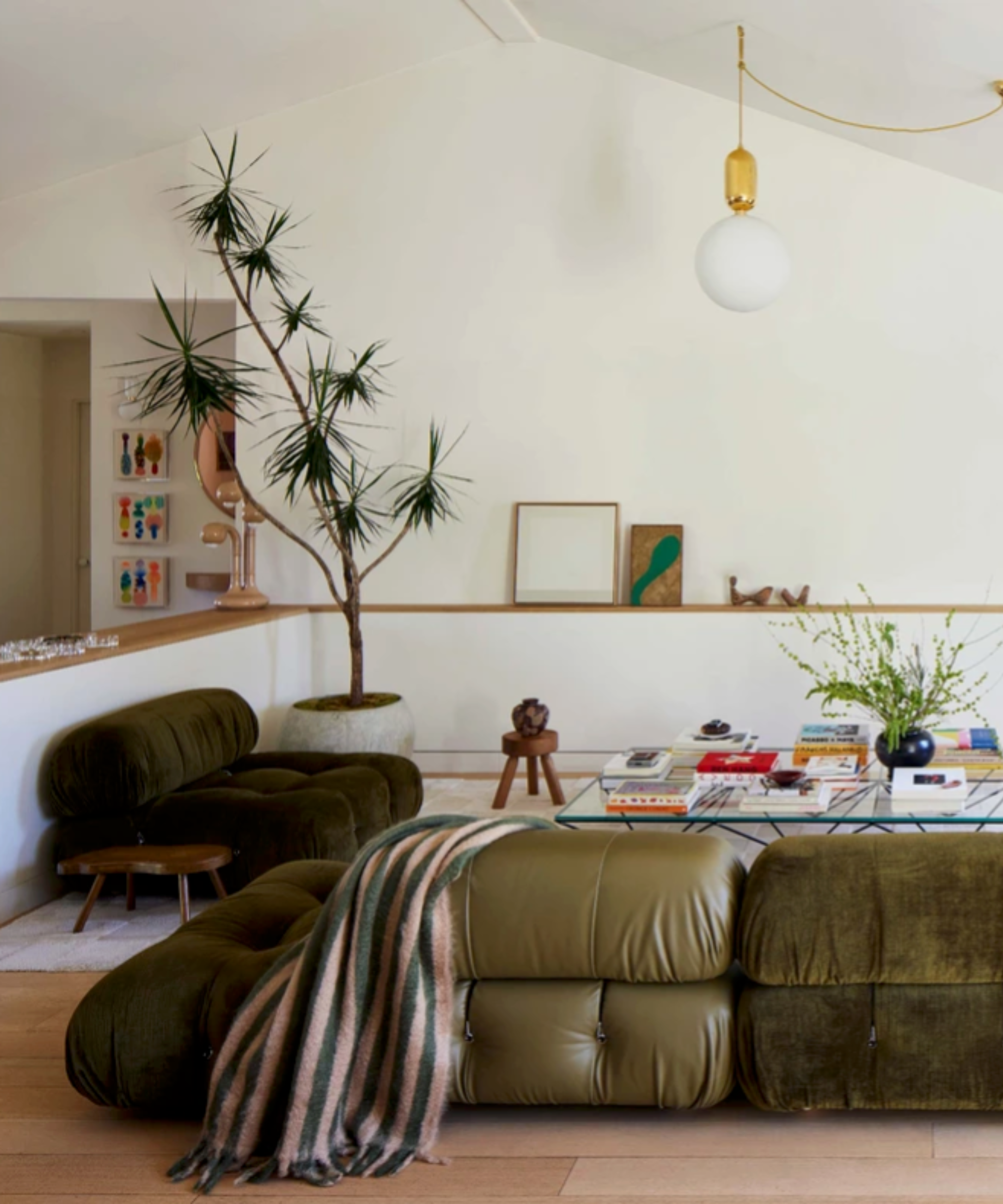 Neutral living room with low green modular sofa