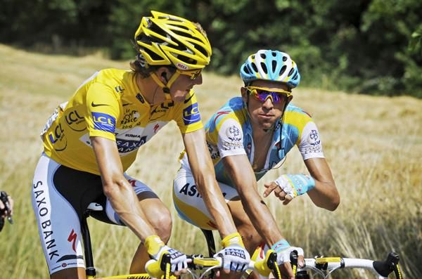 Andy Schleck and Alberto Contador chat during the race