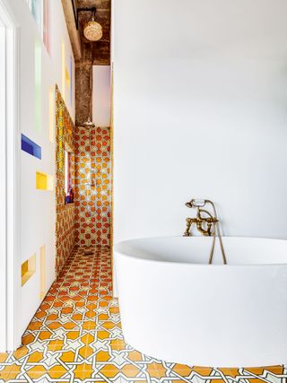 Bathroom with orange tiles