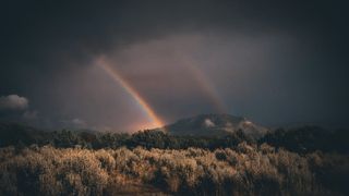 A double rainbow at night