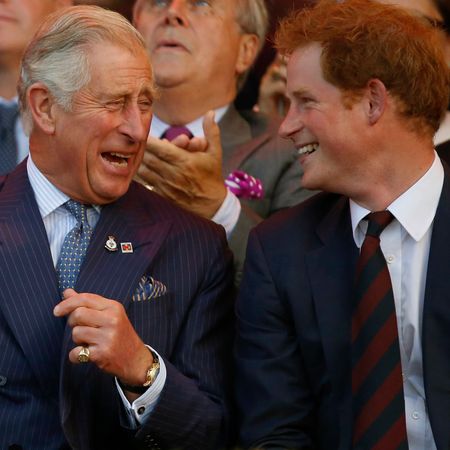 Prince Harry and King Charles laughing
