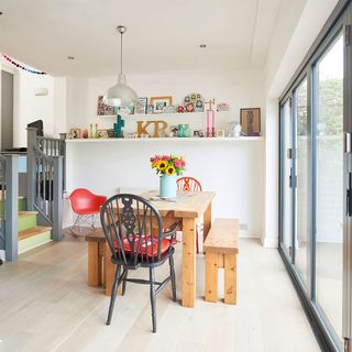 dining area with wooden floor and chairs