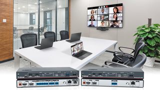 Extron solutions bring audio and video components together in a board room. 