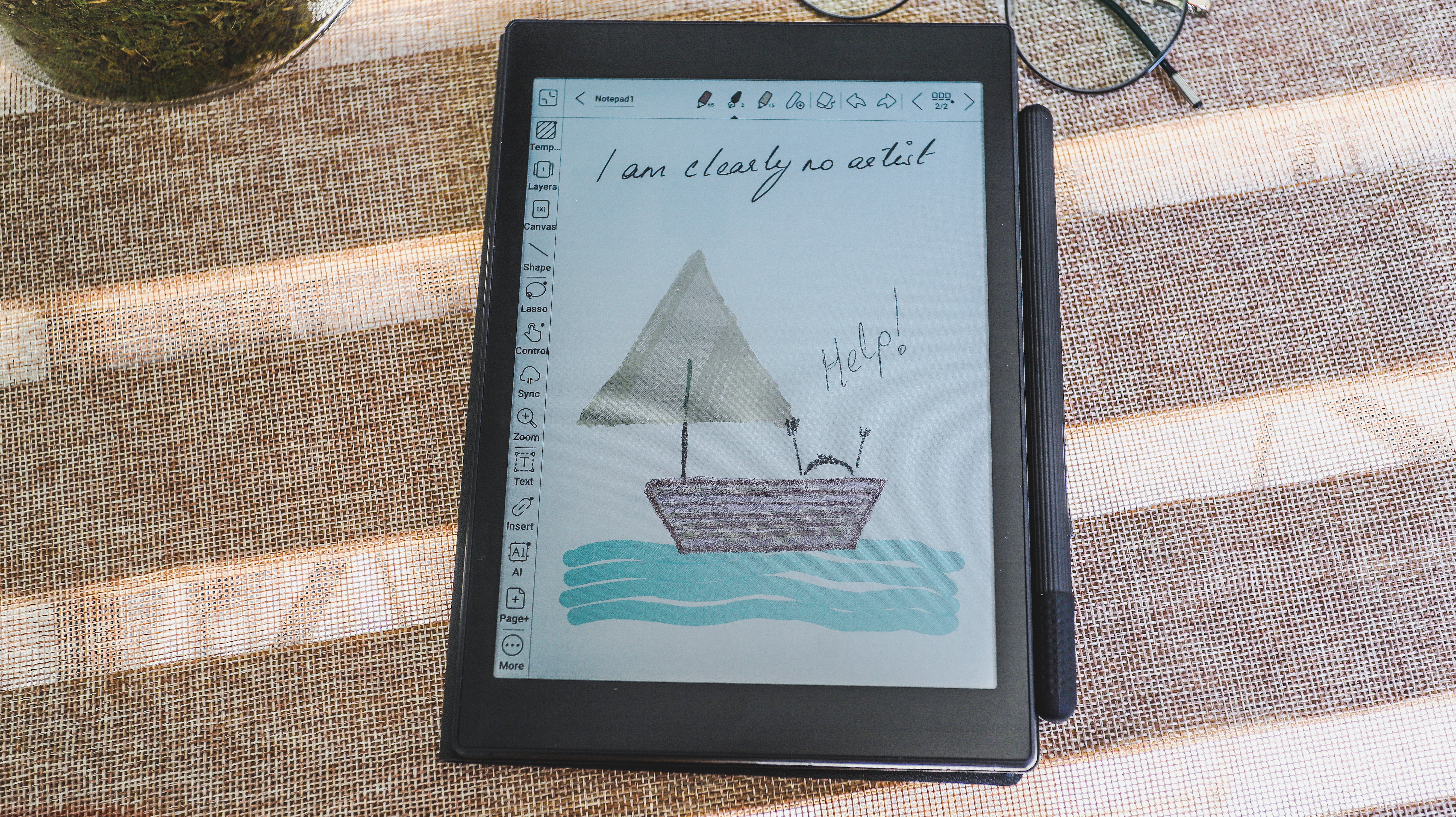 A crude color drawing of a boat on water on the Onyx Boox Tab Mini C ereader