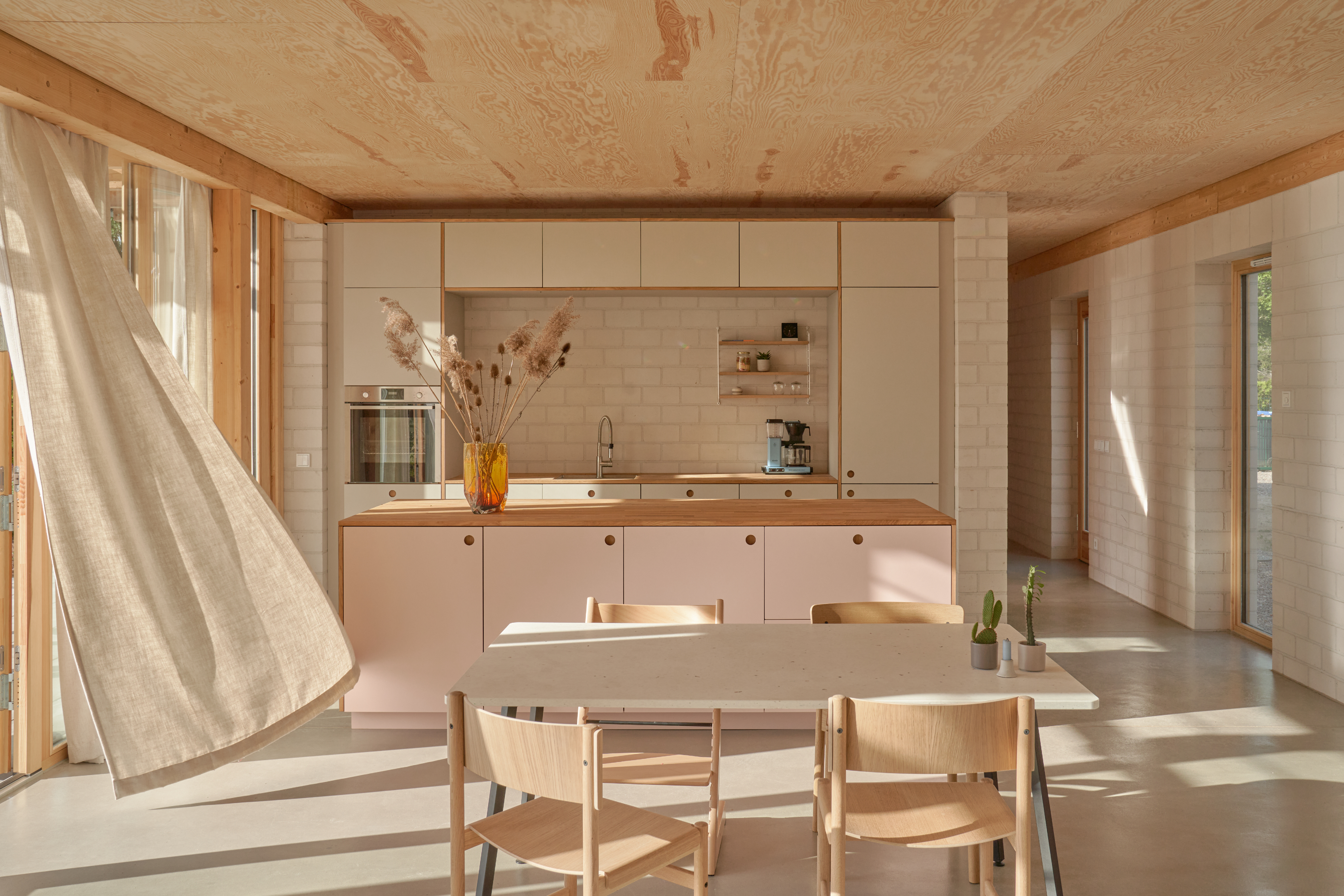 Kitchen with billowing curtain