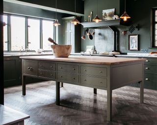Farmhouse kitchen with a chef's table as island