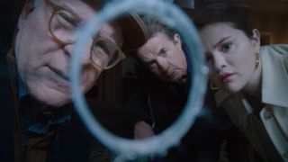 Only Murders In The Building Season 4 Charles Oliver and Mabel look down a sniper scope