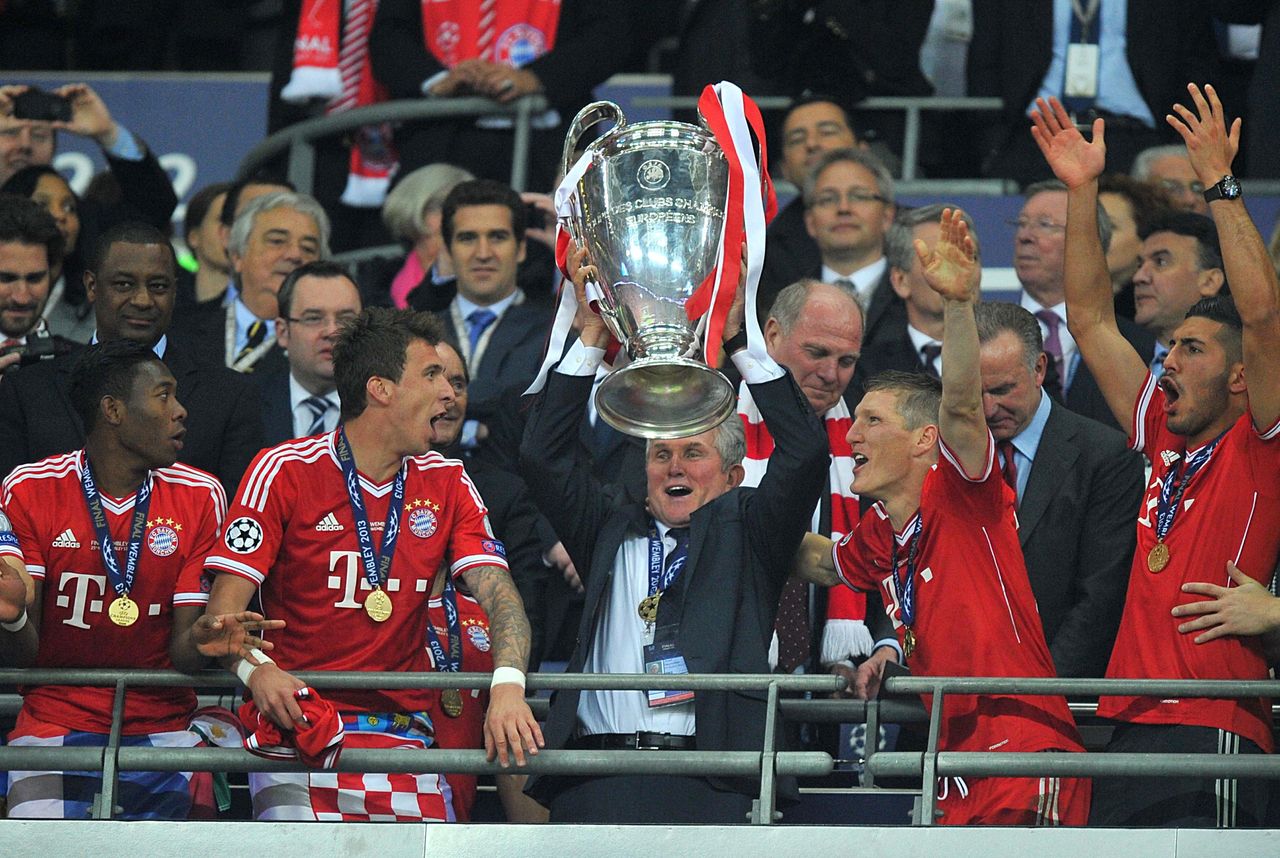 Bayern Munich manager Jupp Heynckes lifts the Champions League trophy after his side's victory over Borussia Dortmund in the 2013 final at Wembley Stadium in London, England