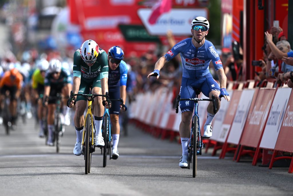 VILLABLINO SPAIN AUGUST 31 Kaden Groves of Australia and Team Alpecin Deceuninck celebrates at finish line as stage winner ahead of Wout van Aert of Belgium and Team Visma Lease a Bike Green Points Jersey L during the La Vuelta 79th Tour of Spain 2024 Stage 14 a 2005km stage from Villafranco del Bierzo to Villablino UCIWT on August 31 2024 in Villablino Spain Photo by Dario BelingheriGetty Images