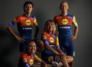 Five Lidl-Trek riders wearing the red, blue and yellow geometric jersey design