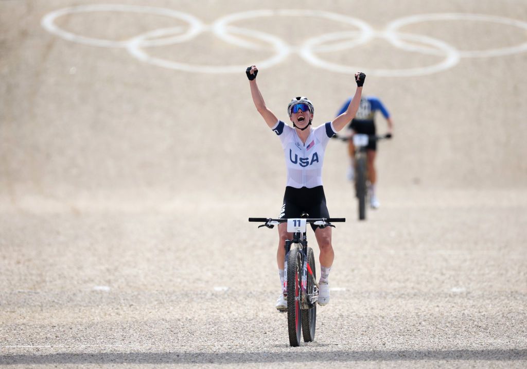 ELANCOURT FRANCE JULY 28 Haley Batten of Team United States celebrates winning silver as she crosses the finish line during the Womens CrossCountry Cycling Mountain Bike Gold Medal race on day two of the Olympic Games Paris 2024 at Elancourt Hill on July 28 2024 in Elancourt France Photo by Jared C TiltonGetty Images