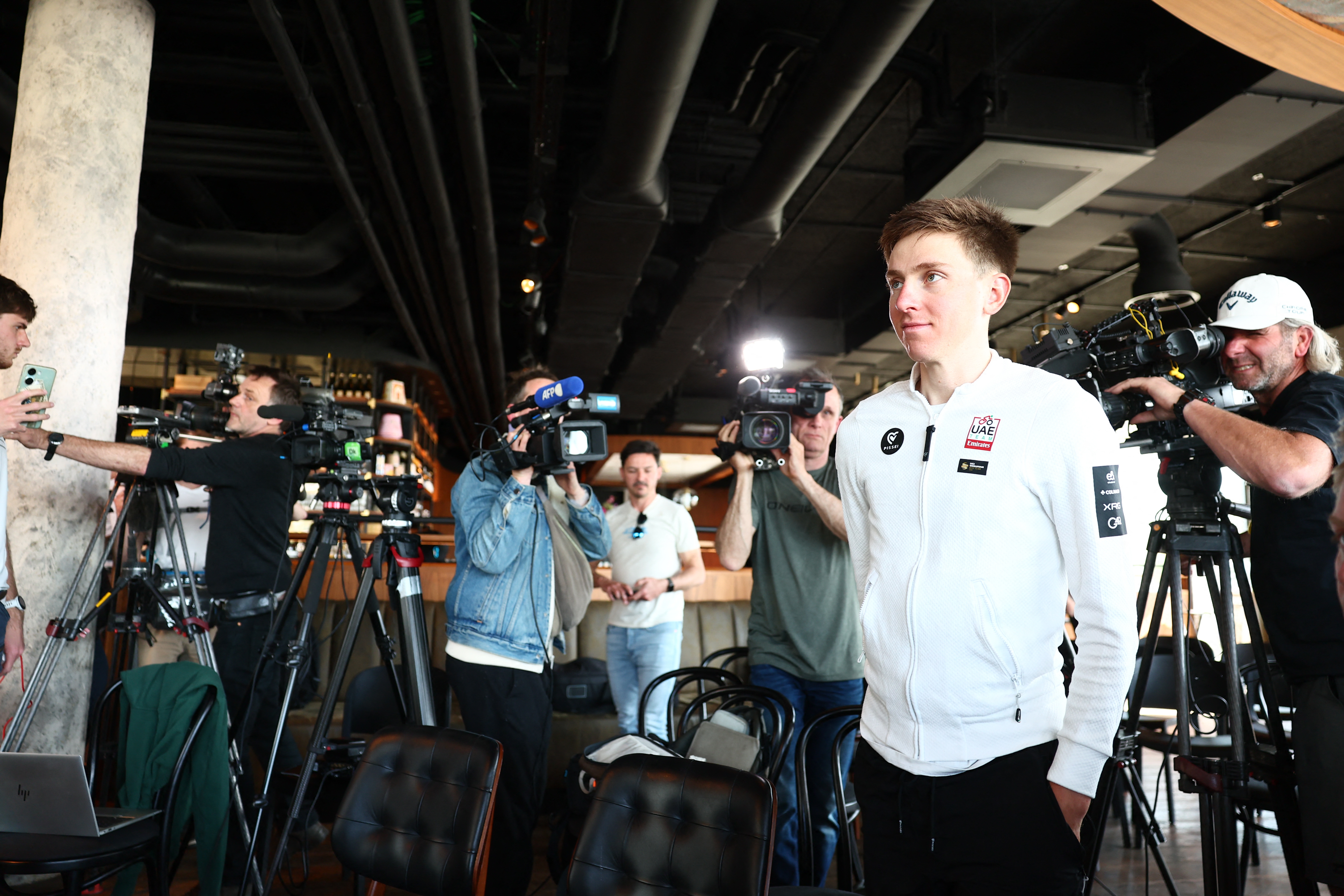 Slovenian Tadej Pogacar of UAE Team Emirates pictured during a press conference of the UAE Team Emirates cycling team ahead of the Ronde van Vlaanderen / Tour des Flandres / Tour of Flanders cycling race, Thursday 03 April 2025 in Waregem. The 109th edition of the cycling race will take place on Sunday 06 April. BELGA PHOTO DAVID PINTENS (Photo by DAVID PINTENS / BELGA MAG / Belga via AFP) (Photo by DAVID PINTENS/BELGA MAG/AFP via Getty Images)