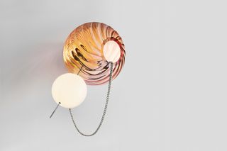 Lindsey Adelman lighting with gold and white spheres