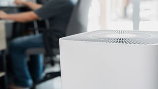 personal air purifier being used in an office