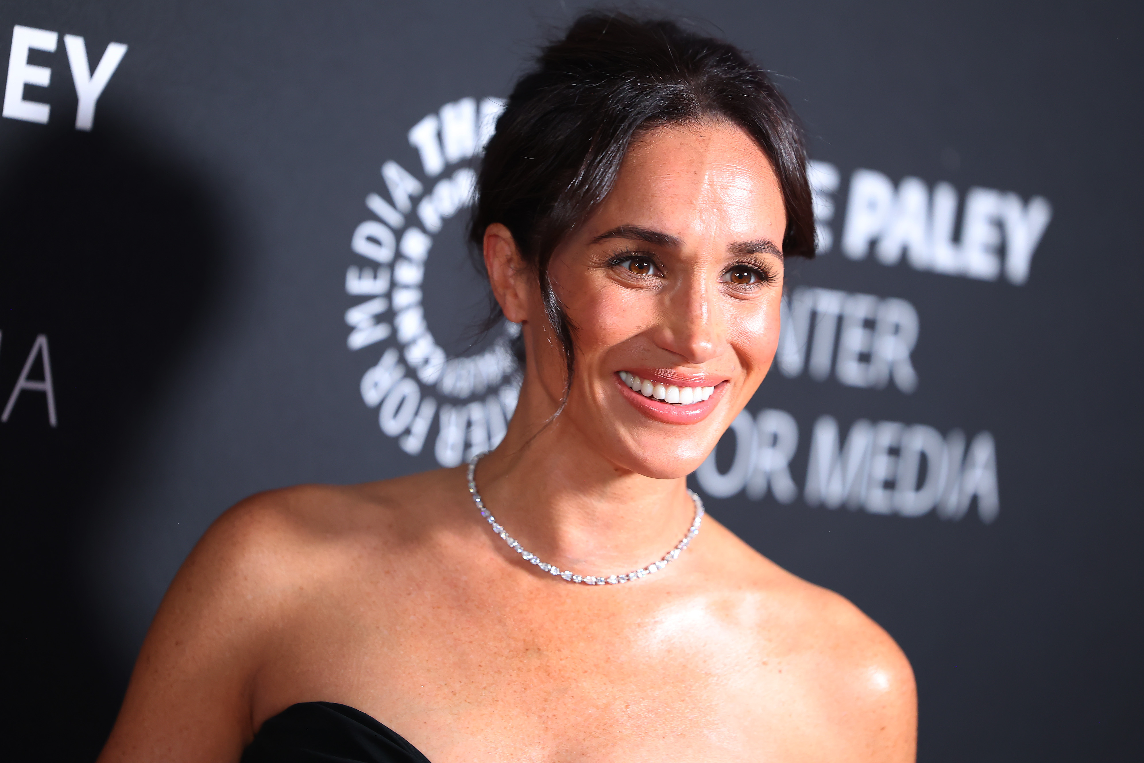 Meghan Markle wearing a diamond necklace