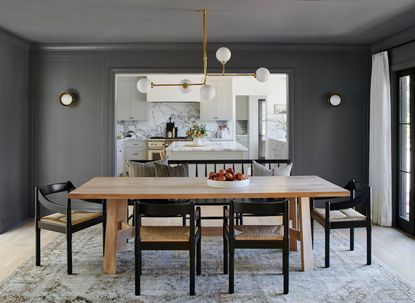 a dining room painted in all grey 